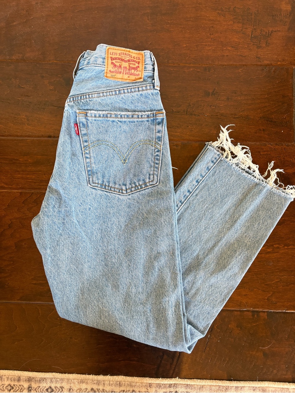 Levi's Light Blue Denim Jeans with Frayed Hem